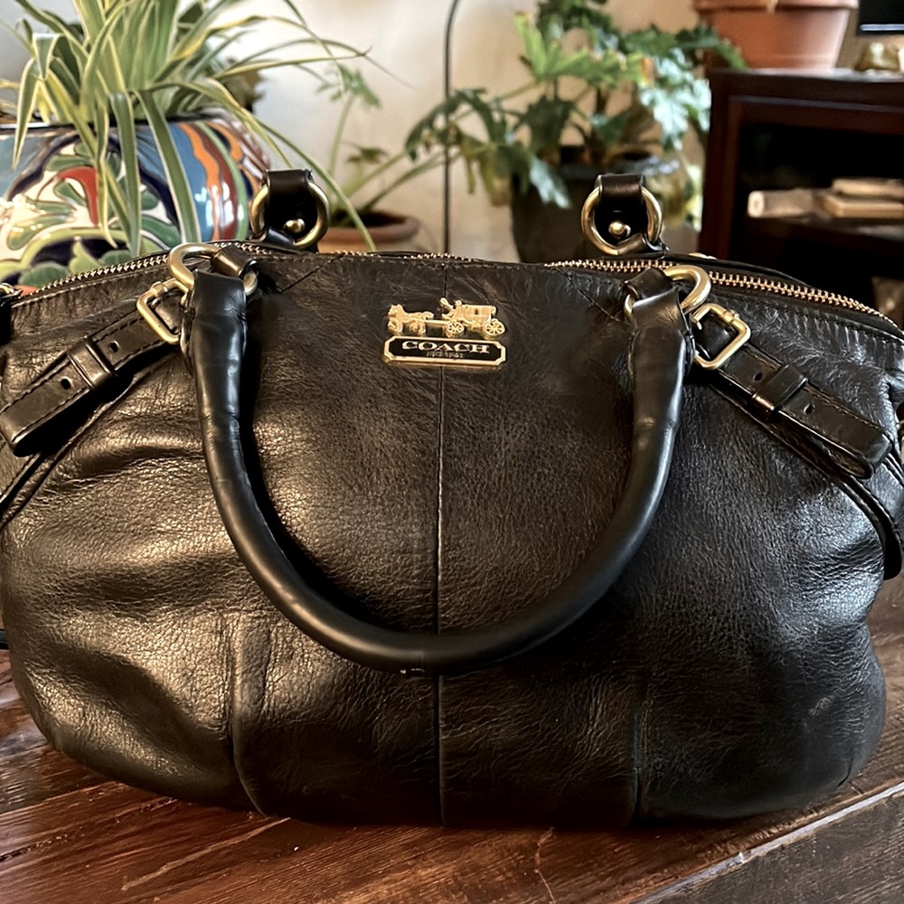 Coach black used hand bag with cross body strap